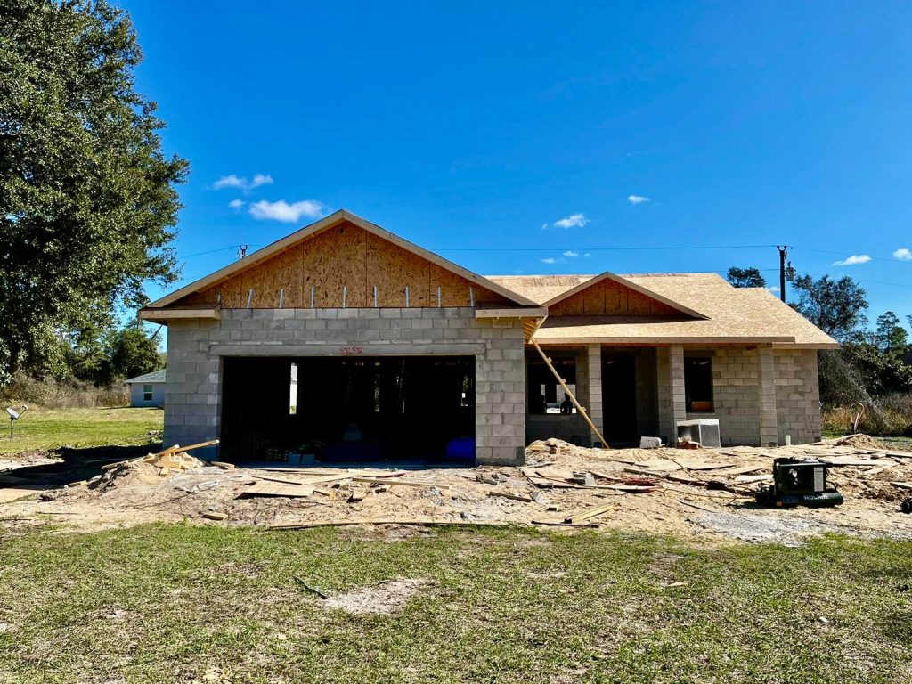 Roof framing on a new construction home by AMA Builders in Citrus Springs, Florida